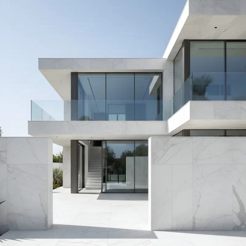Architect reviewing Statuario marble slabs for a premium interior project